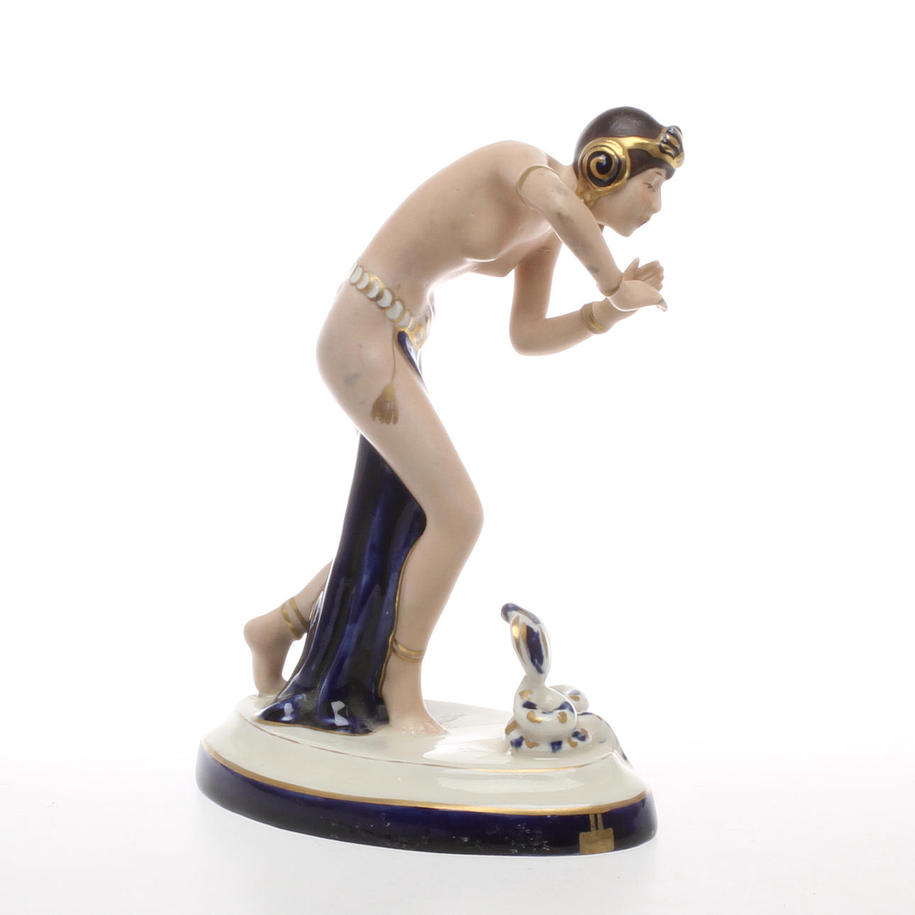 FIGURIN, porslin, ormrtjuserska, Royal Dux, 1900-talets försa hälft.