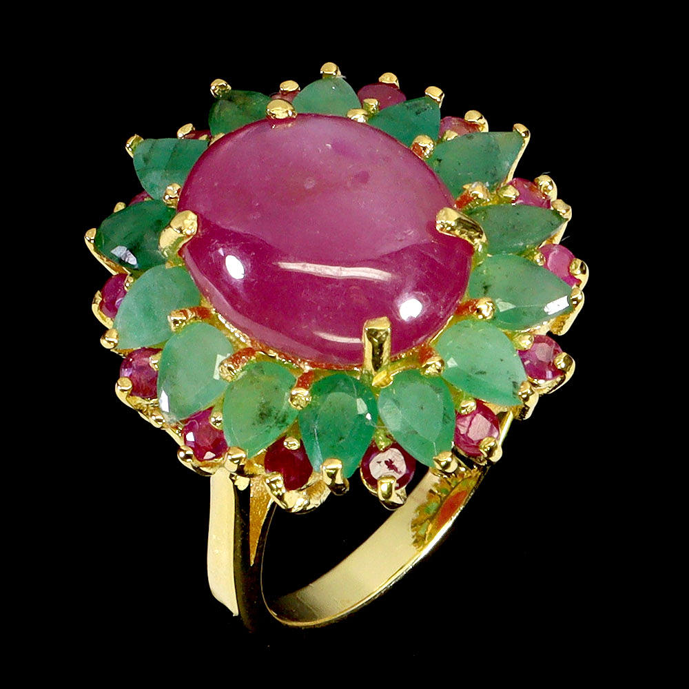LARGE RUBY AND EMERALD SILVER RING.