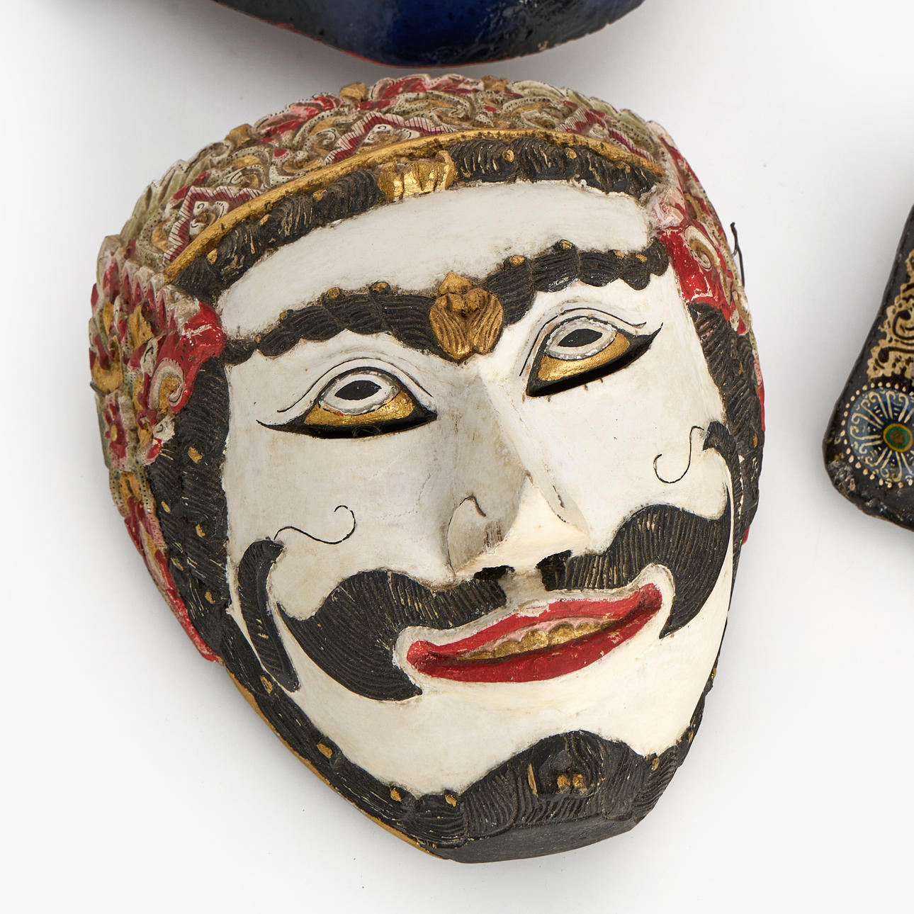 MASKS (4 pieces), cut and painted wood and plaster, Java and Bali, 1960 ...