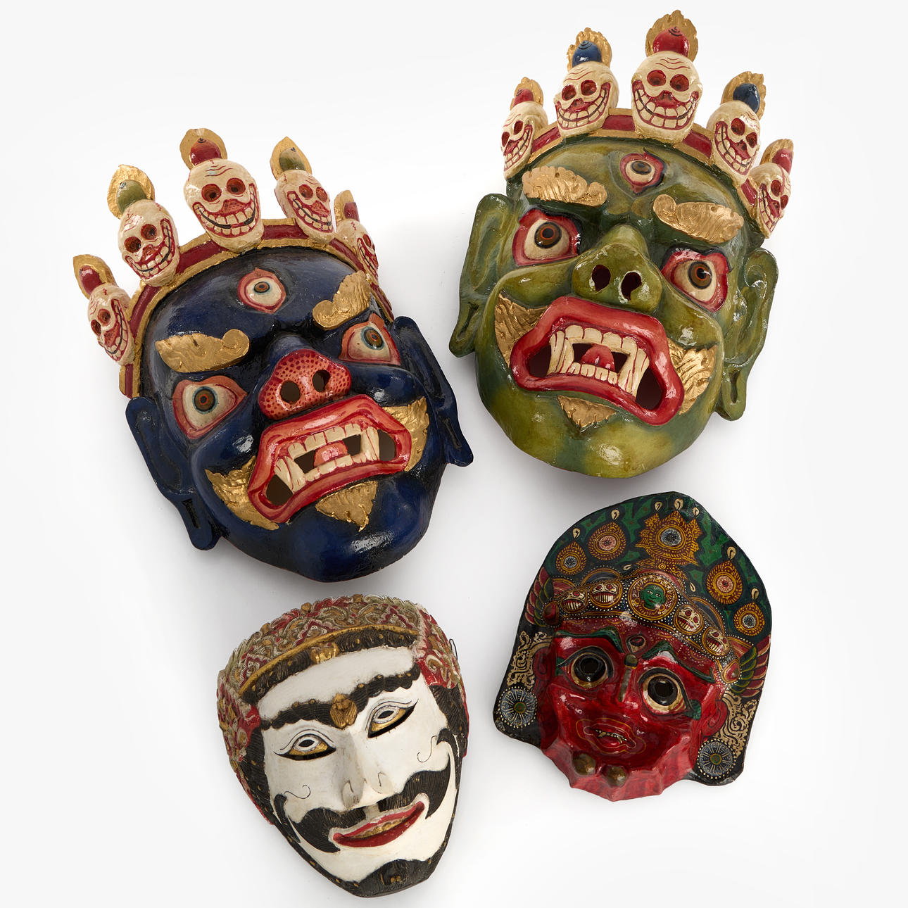 MASKS (4 pieces), cut and painted wood and plaster, Java and Bali, 1960 ...