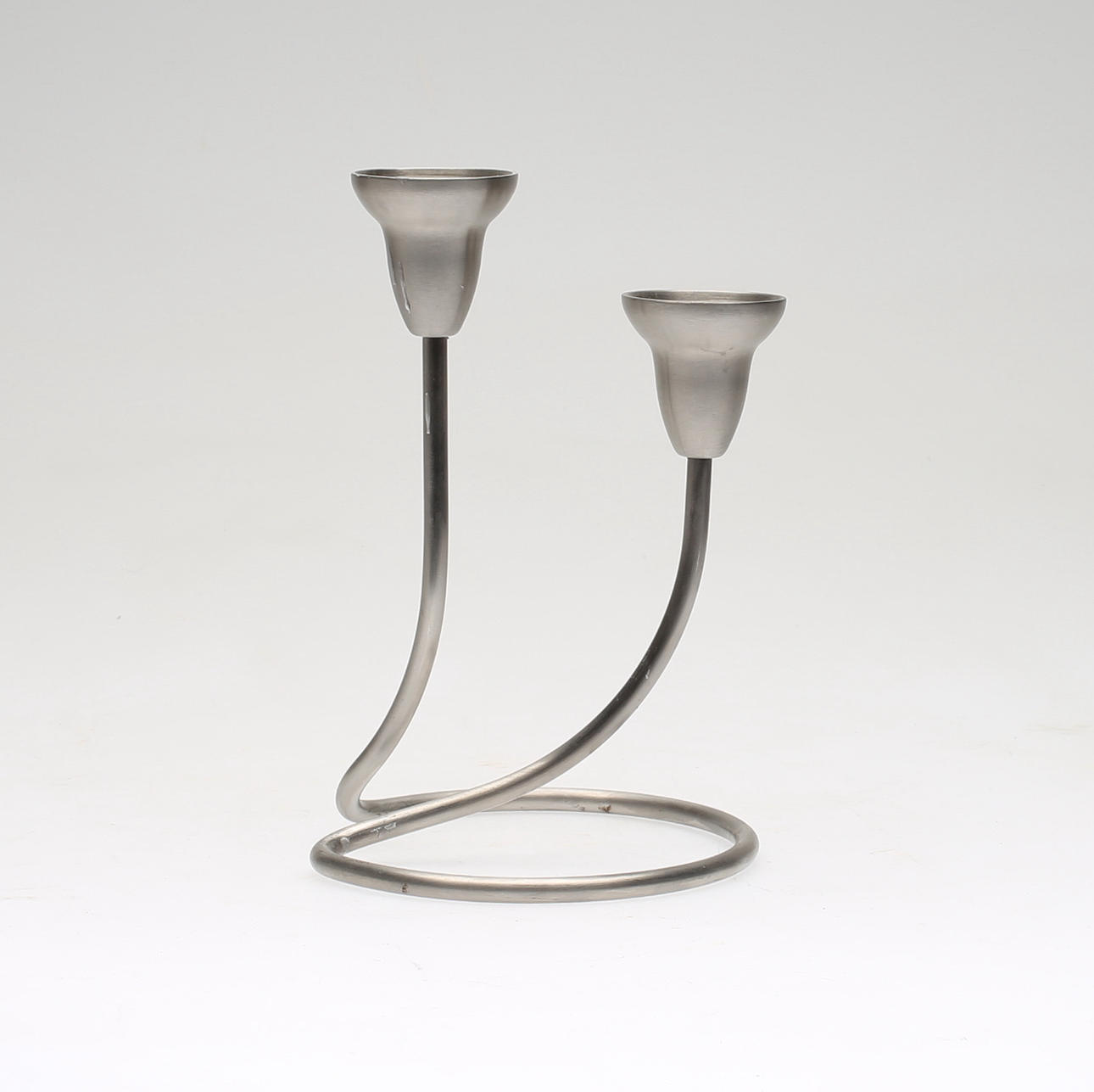 KANDELABER i rostfritt stål, "Swing", Jens Jensen för Georg Jensen, Danmark.