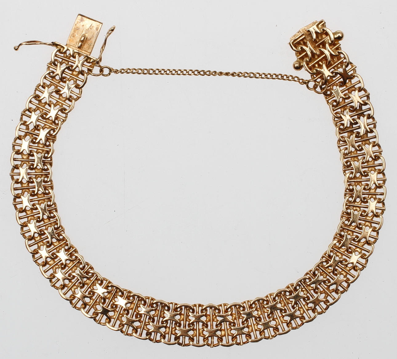 ARMBAND, x-länk med stav, 18k guld, vikt ca 19 gr.