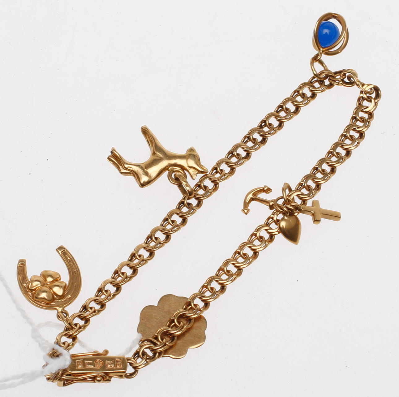 ARMBAND MED BERLOCKER, 18k guld, vikt ca 9 gr.