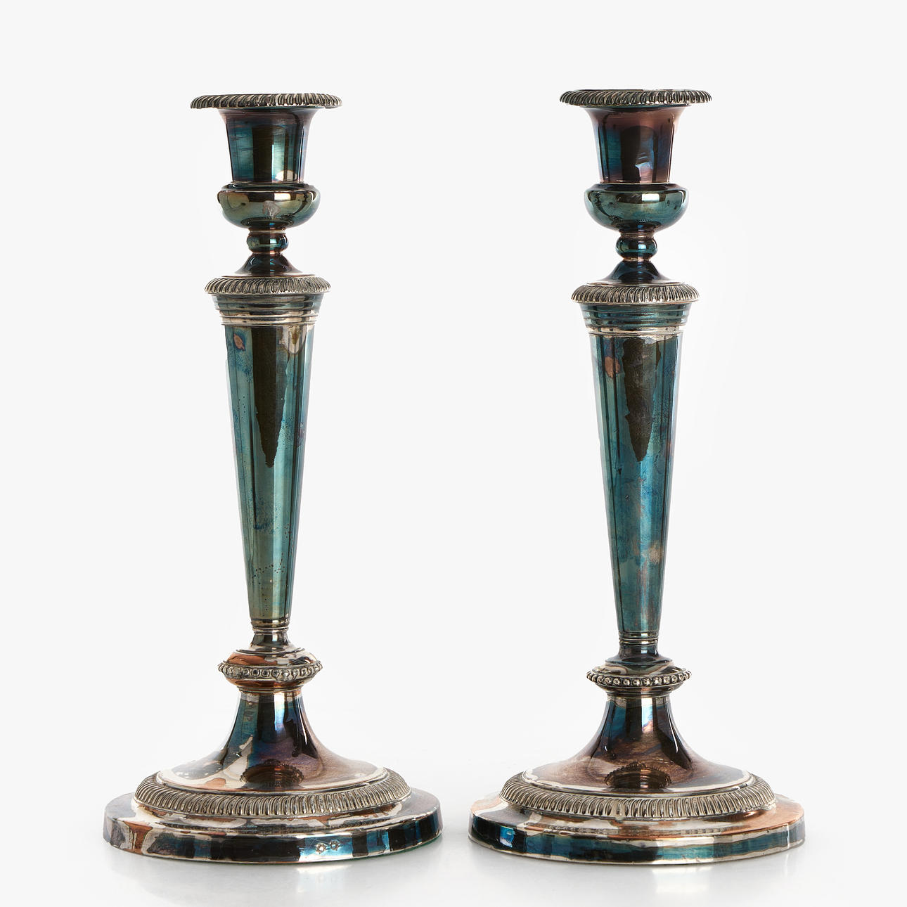 A pair of candlesticks, probably Spain.