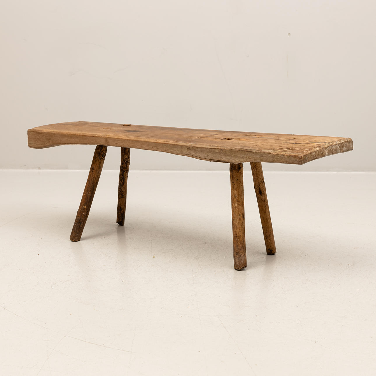 A 20th century pine bench.