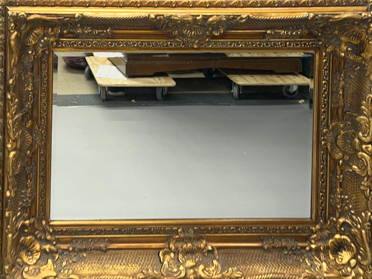 LARGE GILT FRAMED MIRROR.