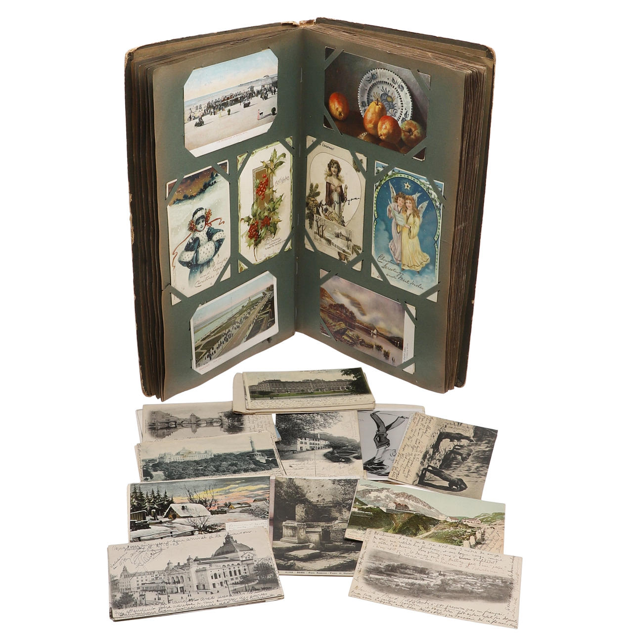 A VINTAGE POSTCARD ALBUM.