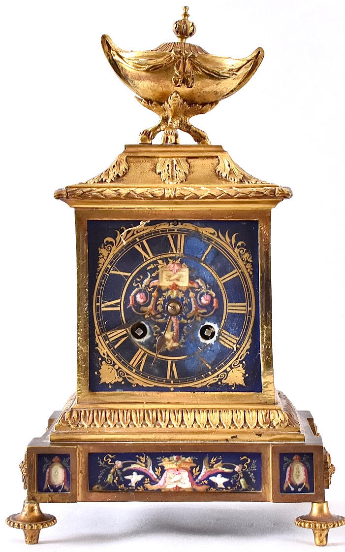 TABLE CLOCK WITH STROKE, burnt-gilt bronze with enamel decor.
