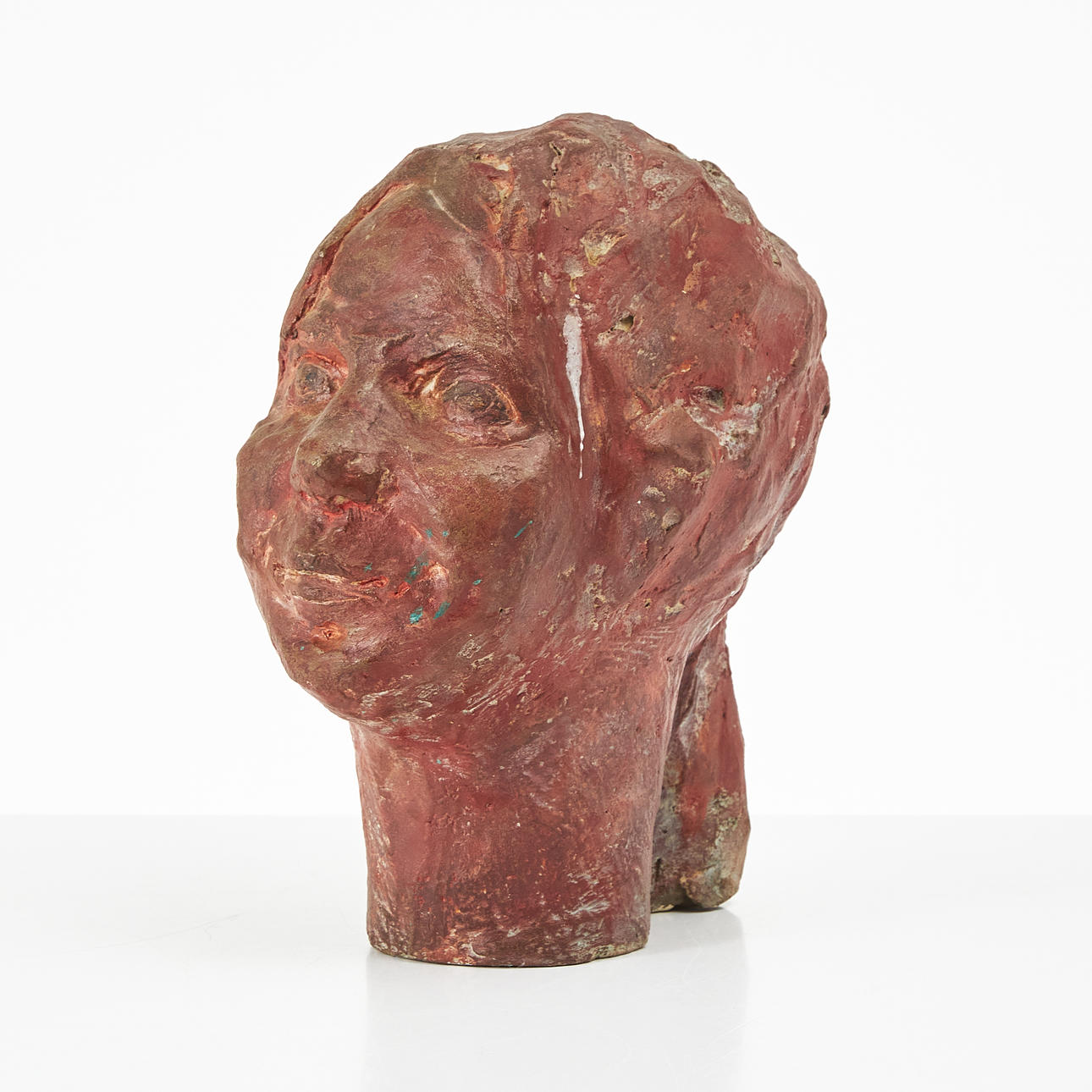 ELVINE OSTERMAN (1908-1997). Girl's head, earthenware, painted.
