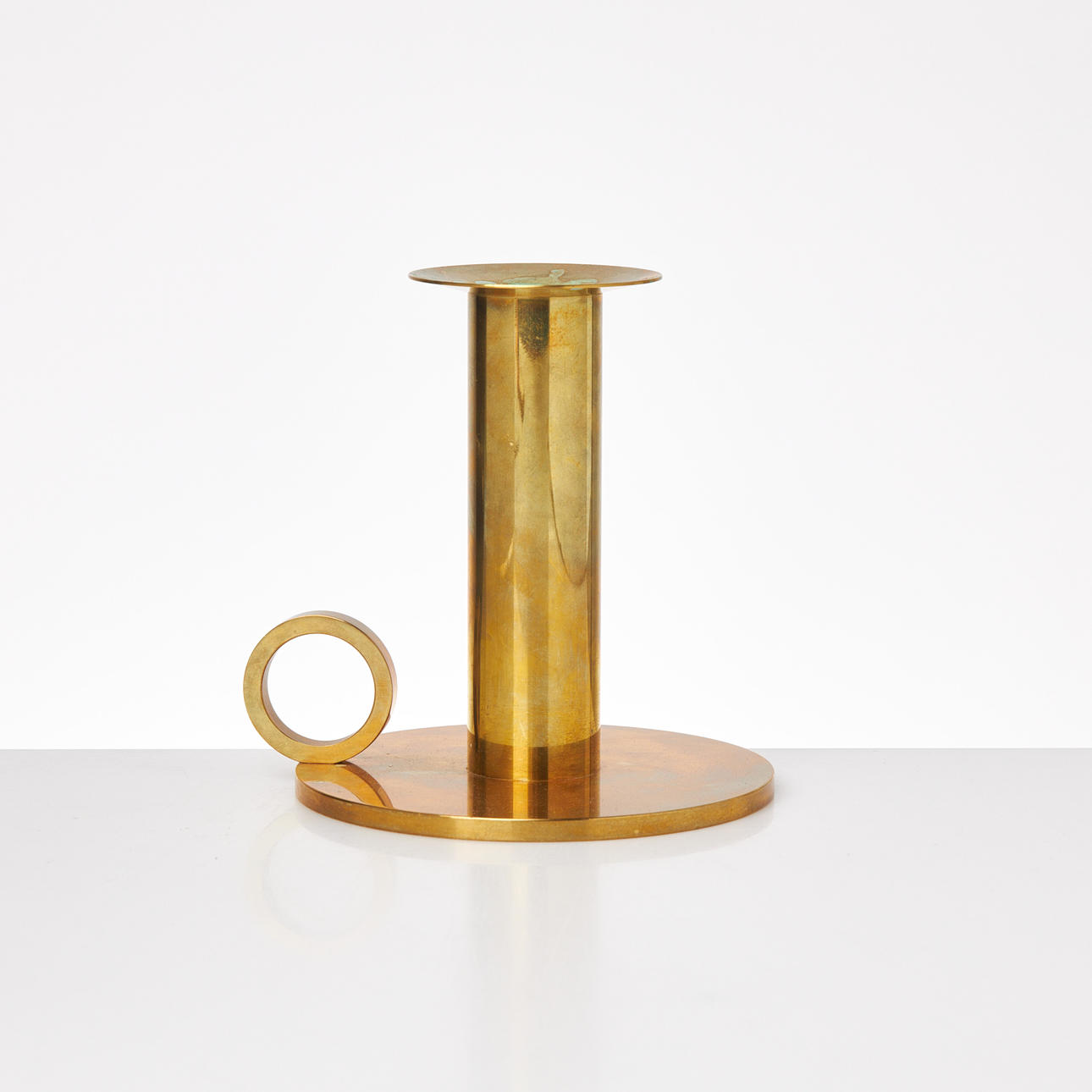 SIGURD PERSSON. “Chamber candlestick”, brass, marked.