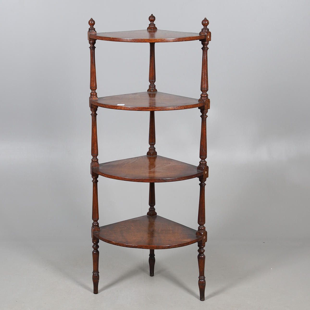 A VICTORIAN FOUR TIER WHATNOT.