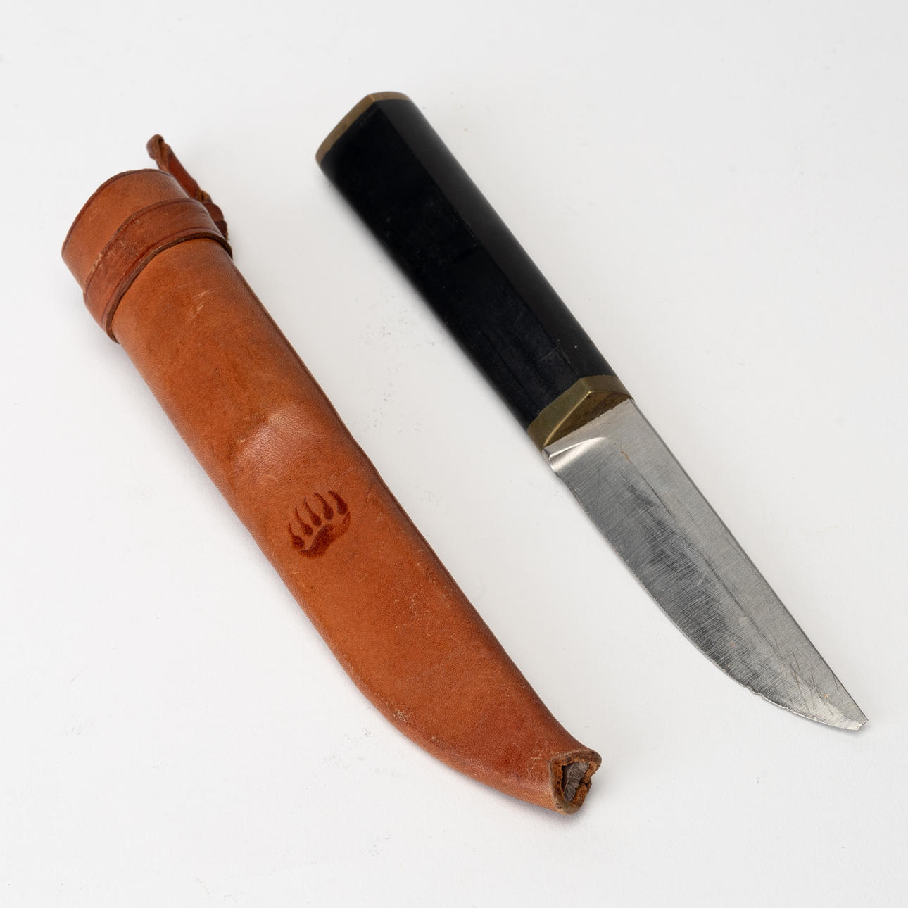 TAPIO WIRKKALA. Puukko- Knife, stainless steel, nylon, brass