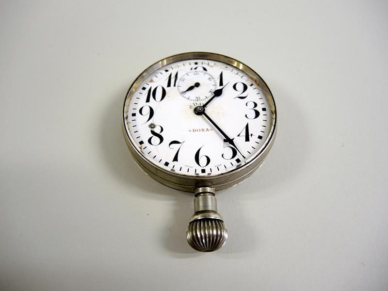 DOXA OMBORD KLOCKA.