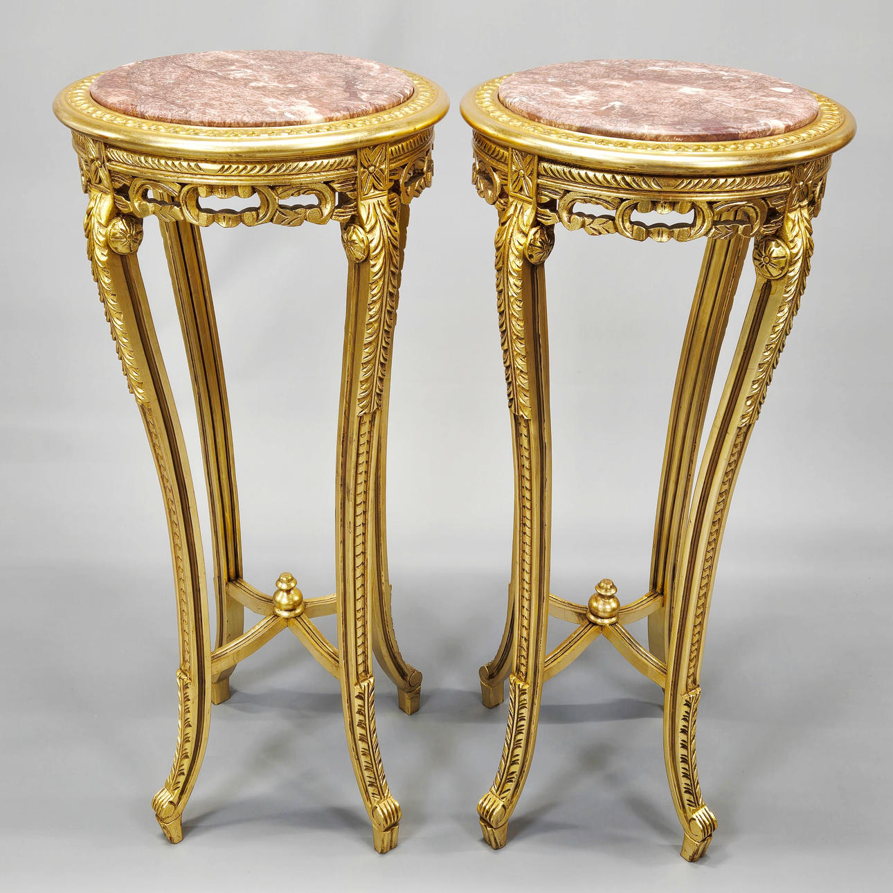 MARBLE TOPPED GILT WOODEN STANDS.