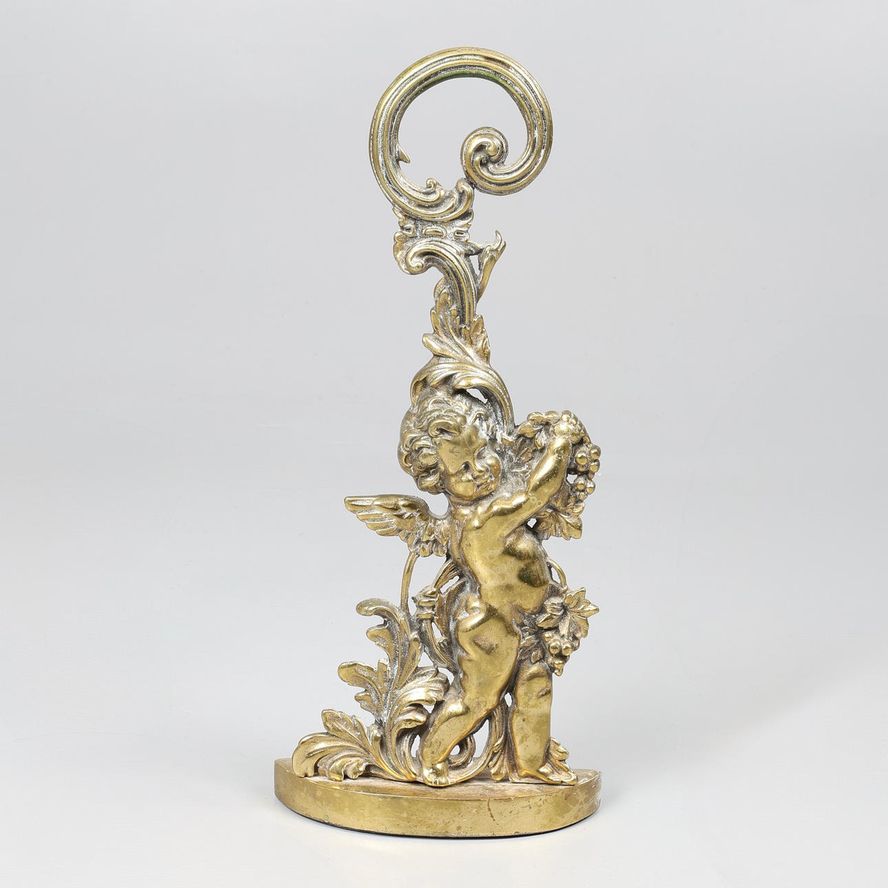 VICTORIAN CAST BRASS DOOR PORTER.