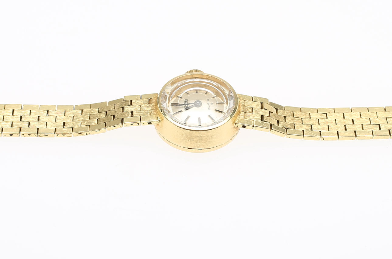 DAMARMBANDSUR, samt armband, 18K guld, Roamer. Totalvikt ca 27,6 g.