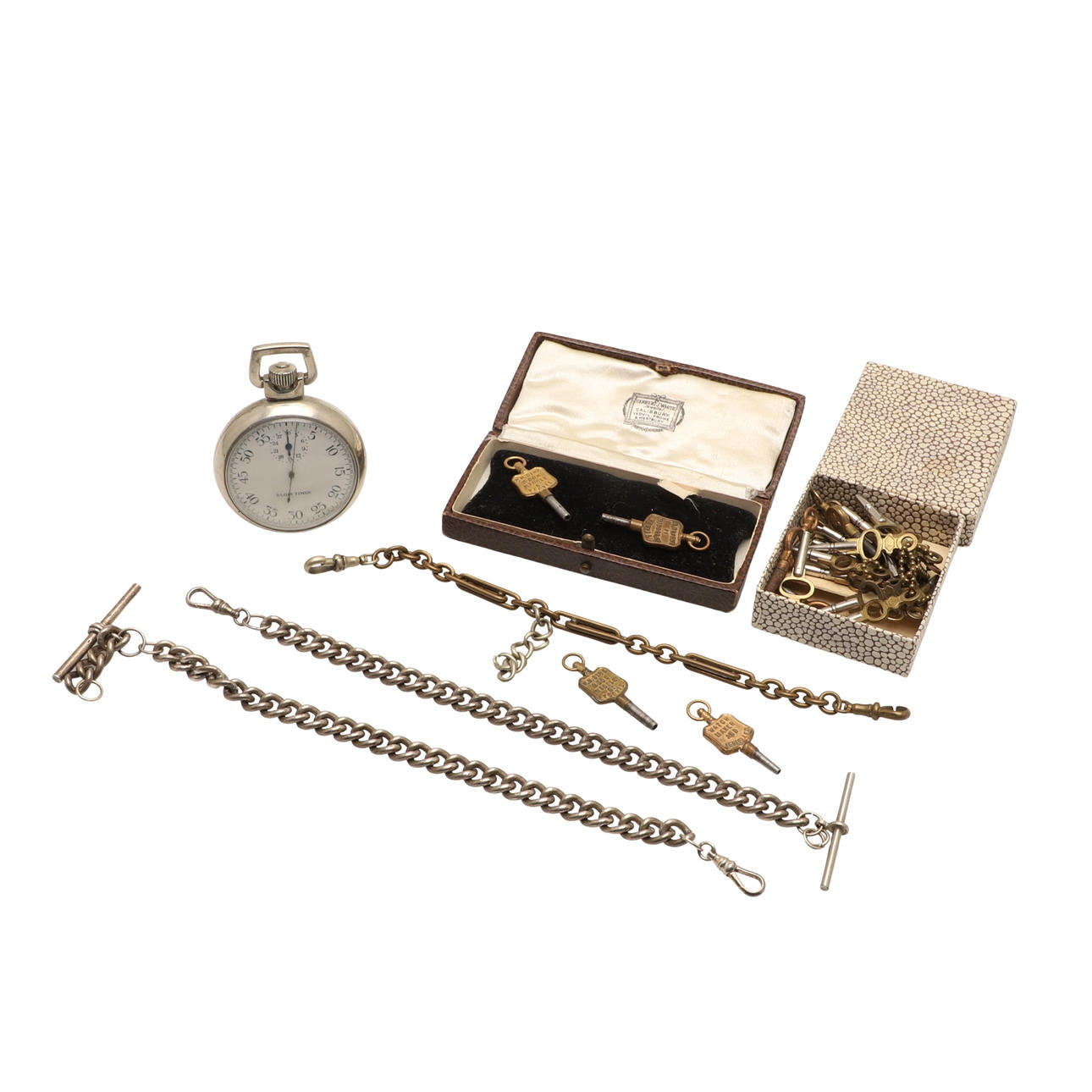 TWO SILVER ALBERT CHAINS.