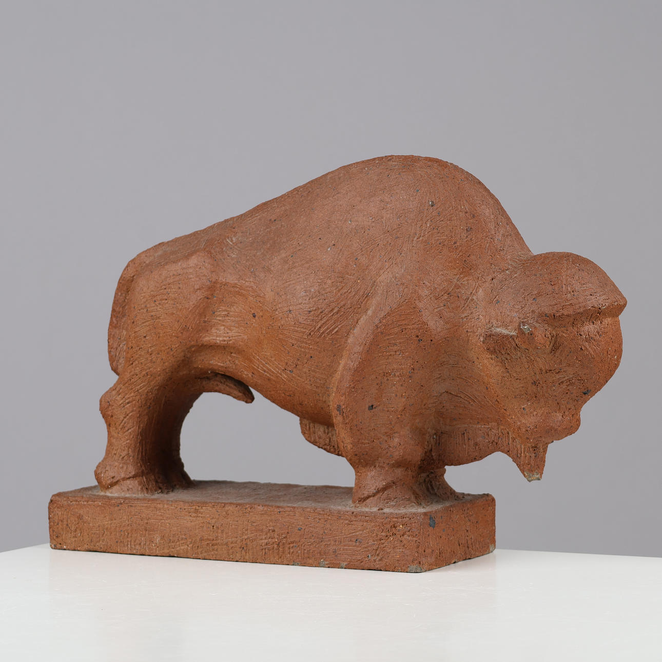 Unknown artist, stoneware bison, signed, 20th century.