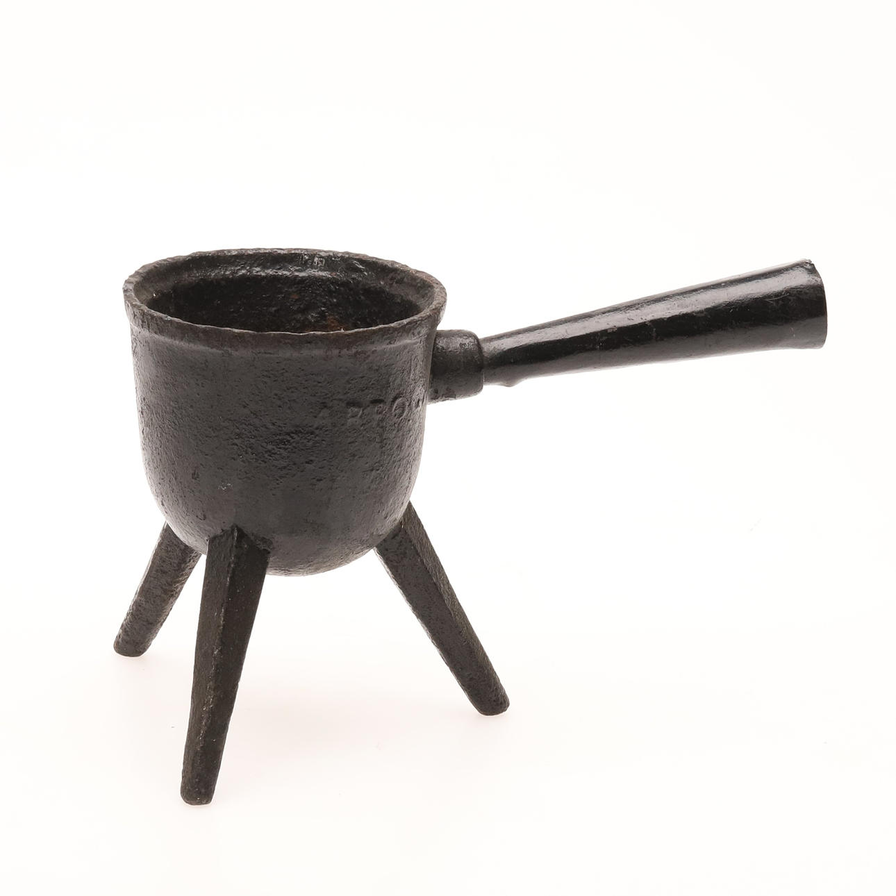 A cast iron cauldron, marked Arboga.