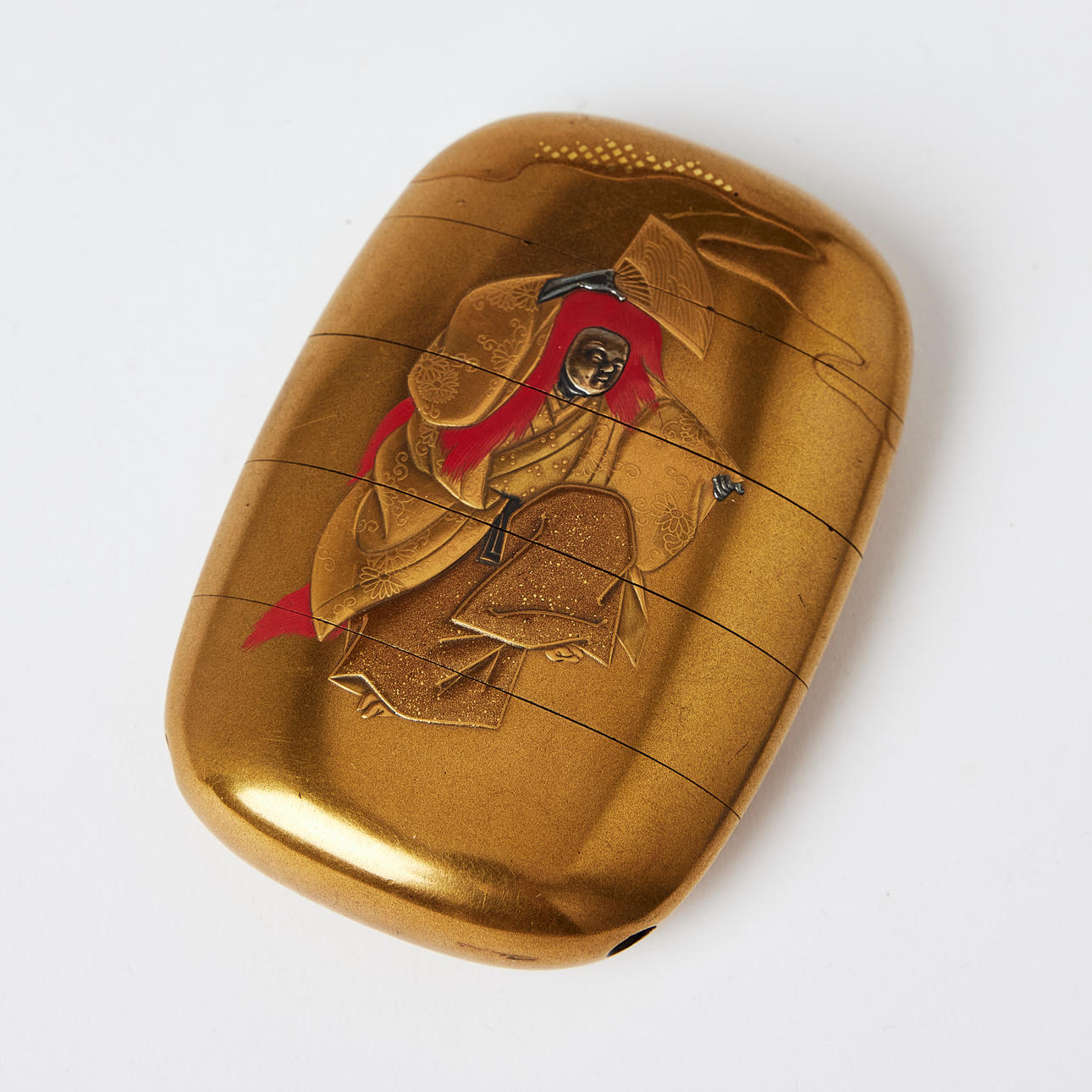 1224. A Japanese Gilt-Lacquer Four-Case Inro