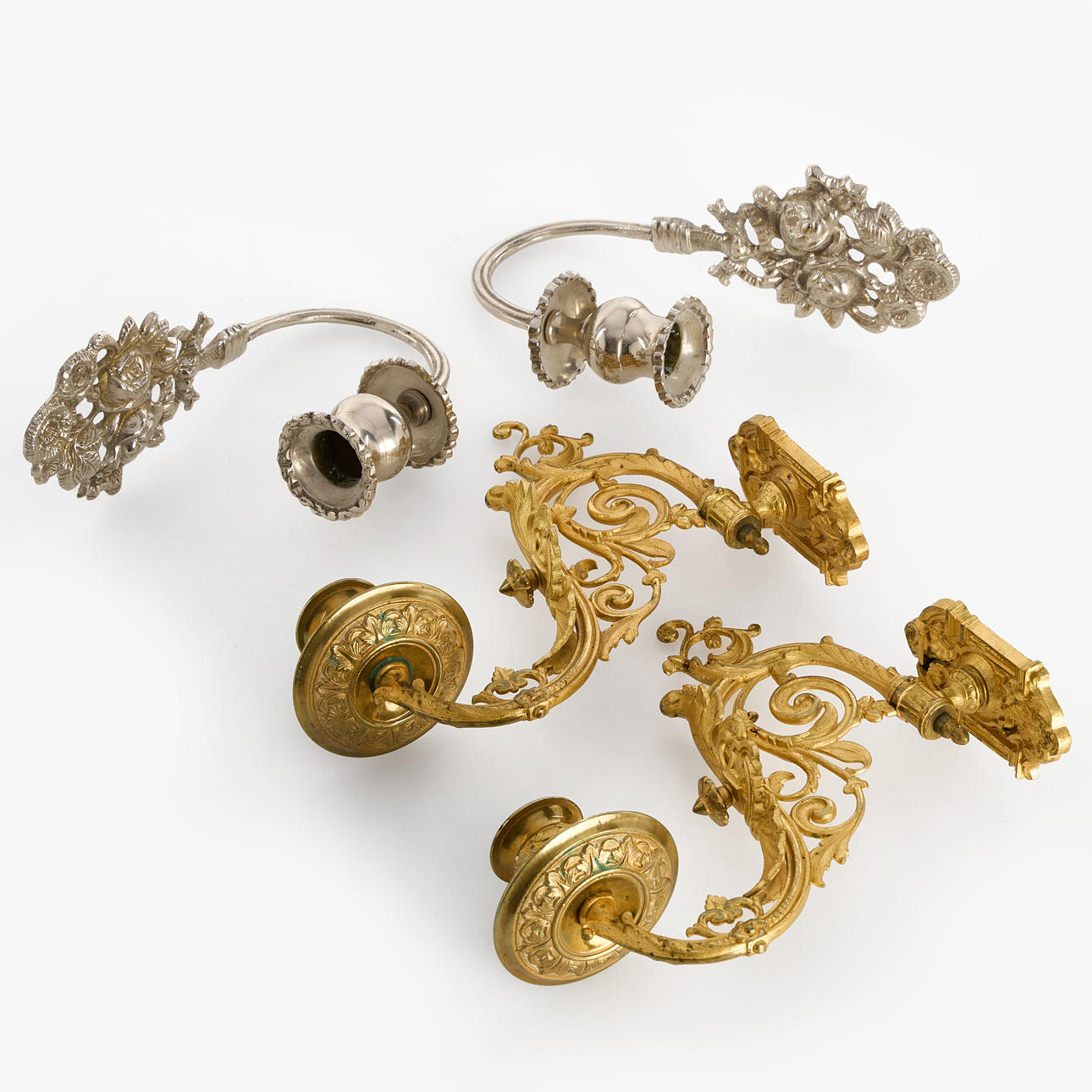 CANDLESTICKS, 2 pairs, gilt or nickel-plated brass.