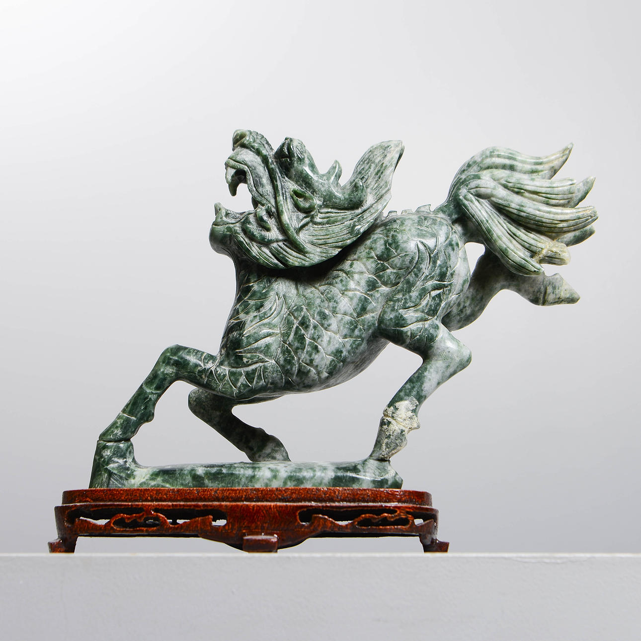 A Longma Chinese serpentine stone sculpture, 20th century. Asiatica ...