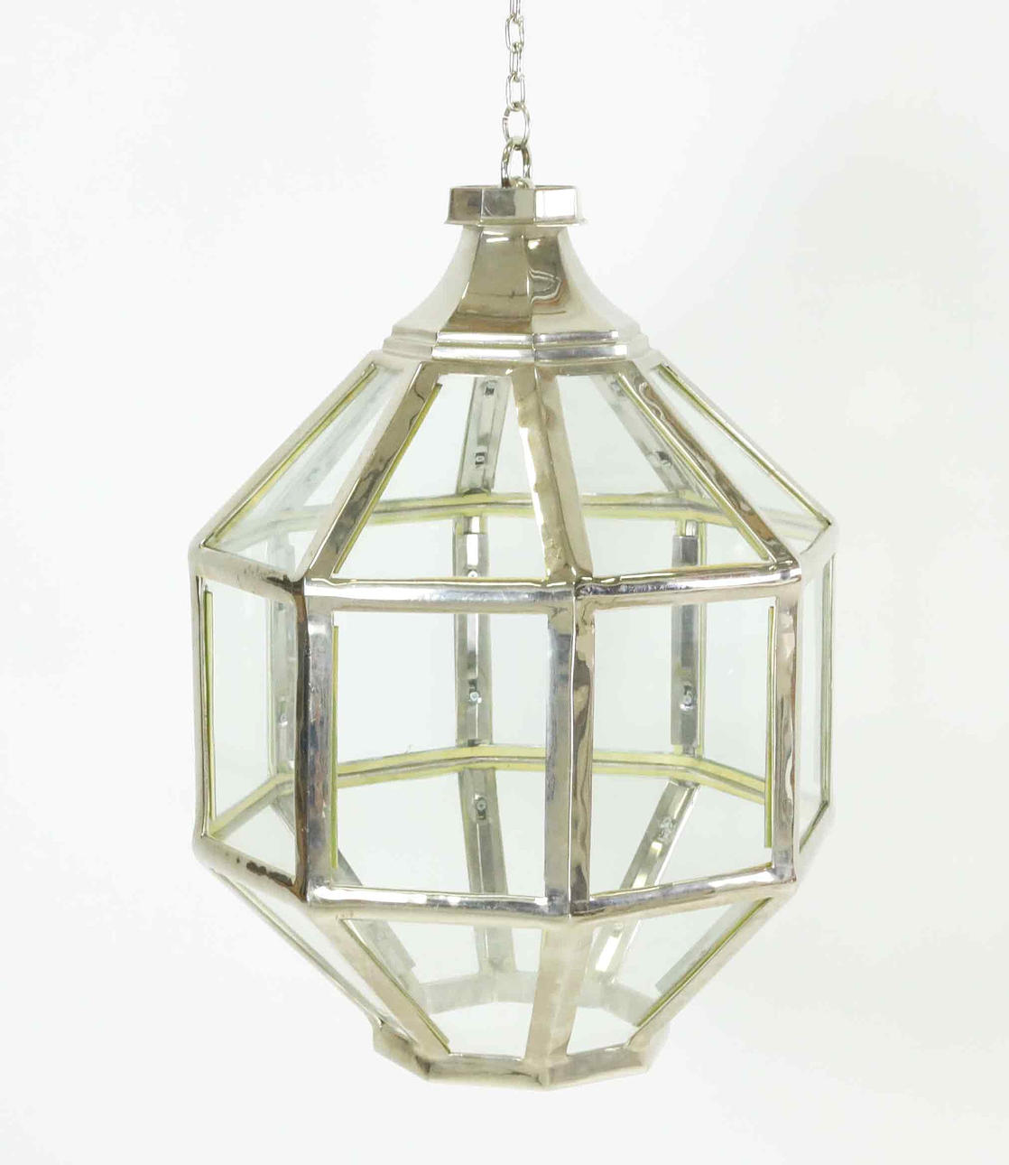 A glass and metal lantern, contemporary.