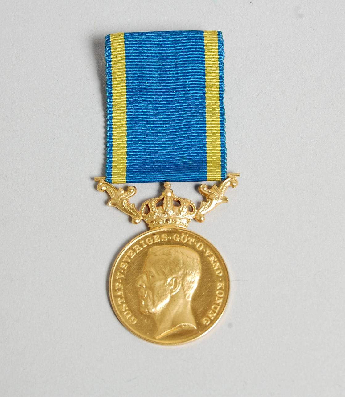 GULDMEDALJ, 23 karat,18 karat, vikt 11 g.