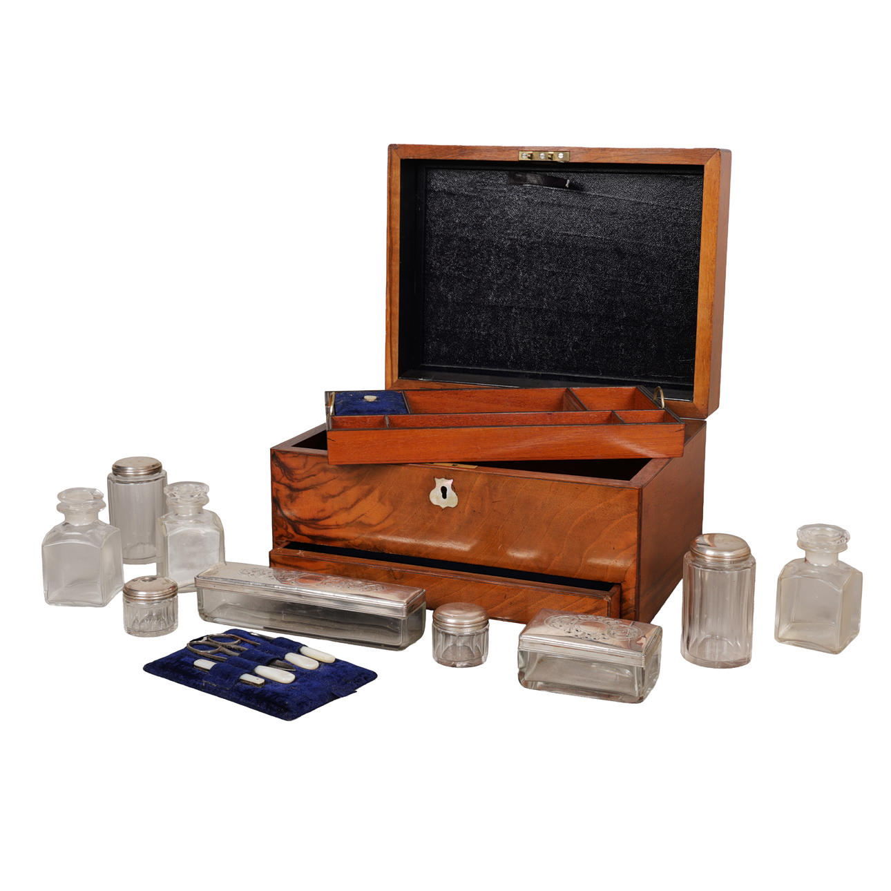 A VICTORIAN WALNUT VANITY CASE.