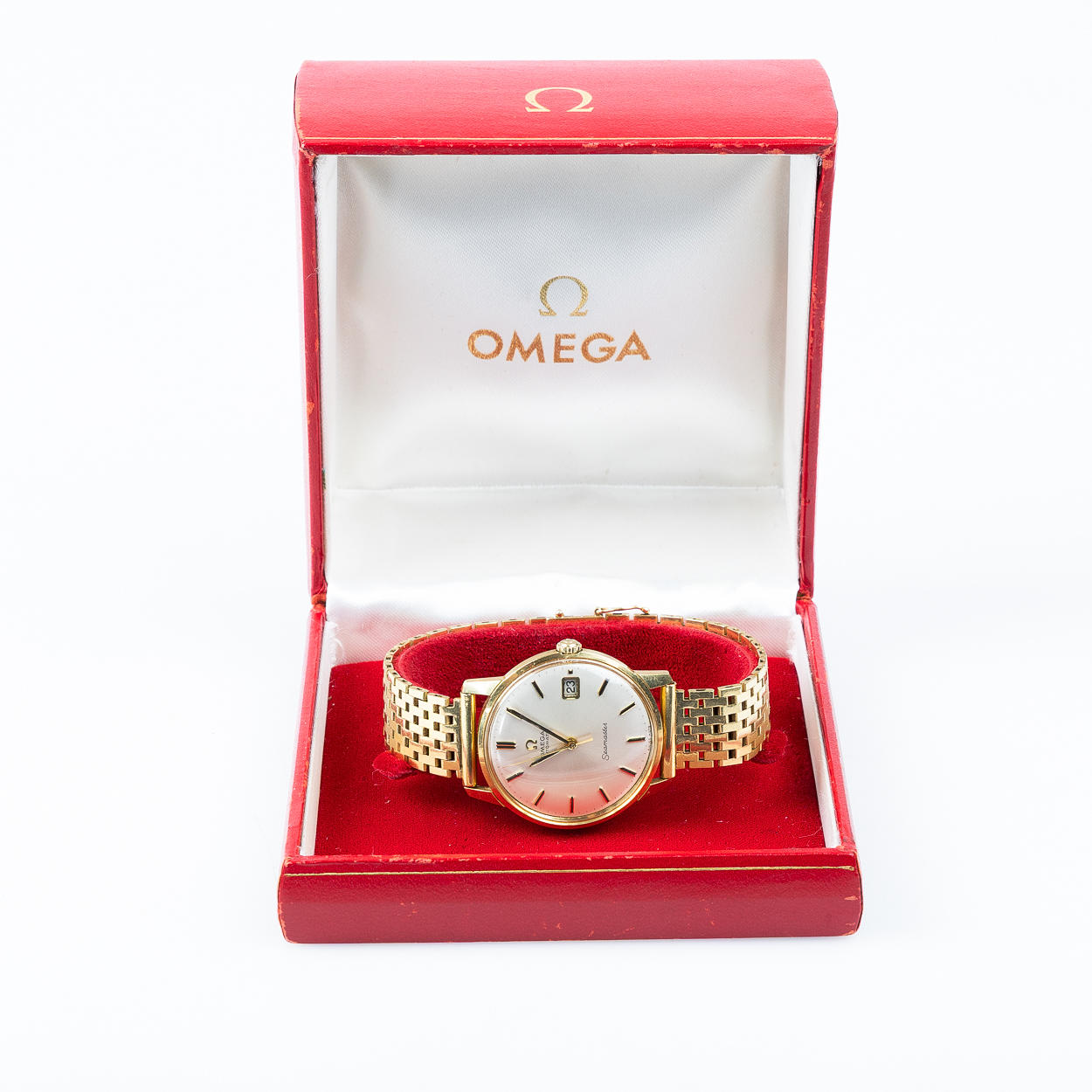 OMEGA SEAMASTER, Automatic, 18K gold in case and link.