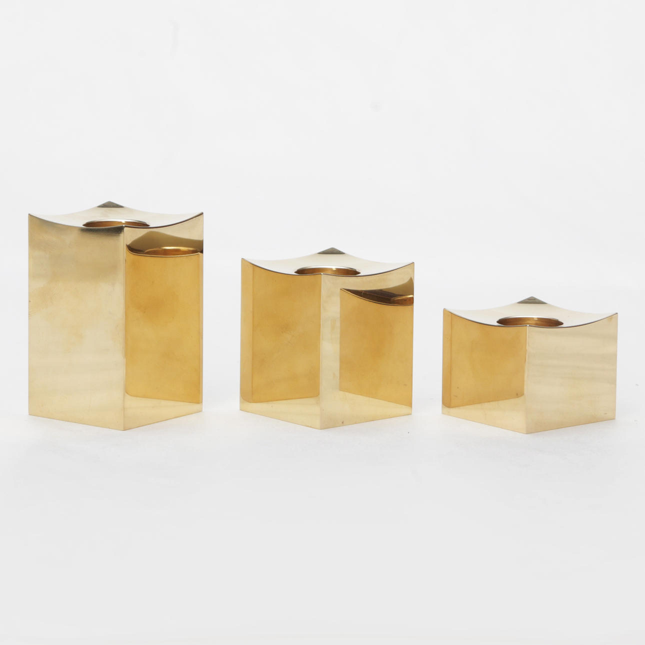 A 3-piece brass candlestick, Gusum.