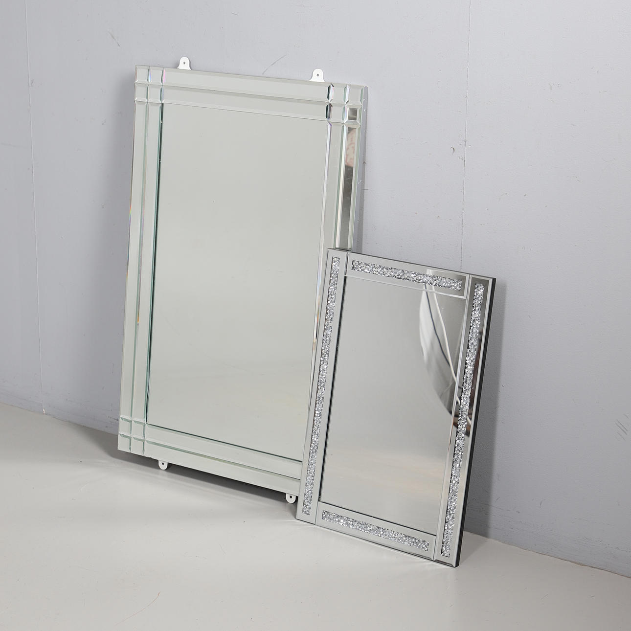 TWO MODERN MIRRORS. Mirrors - Auctionet
