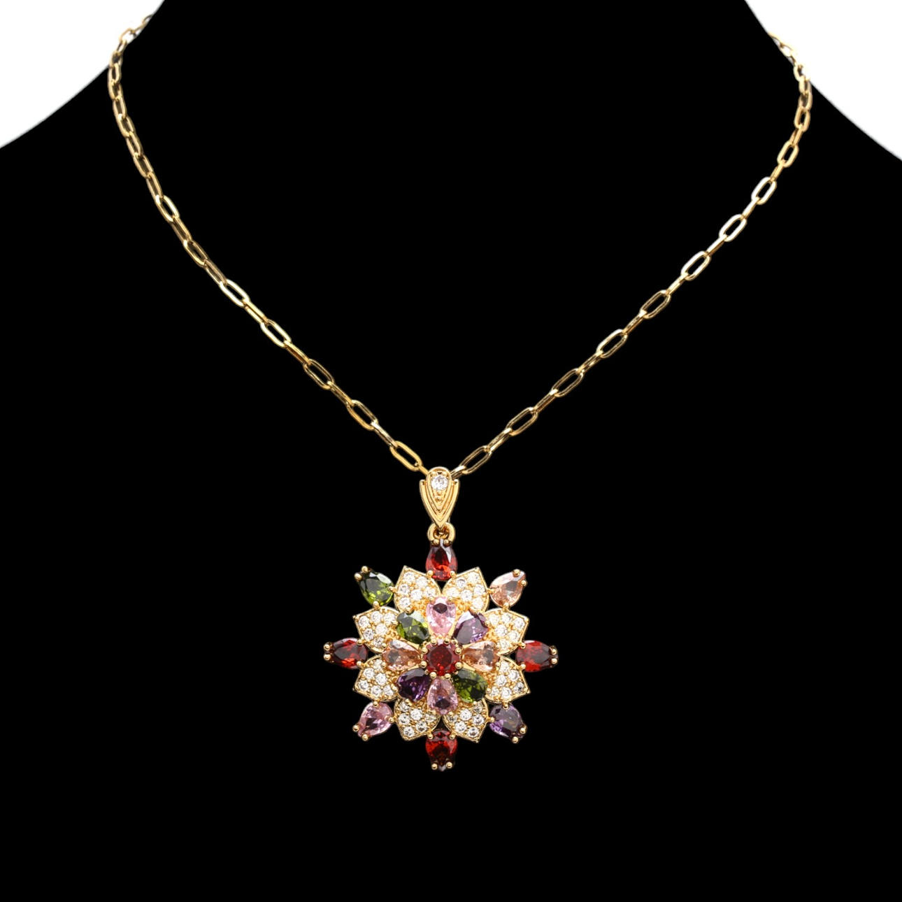 Rhinestones pendant and earrings.
