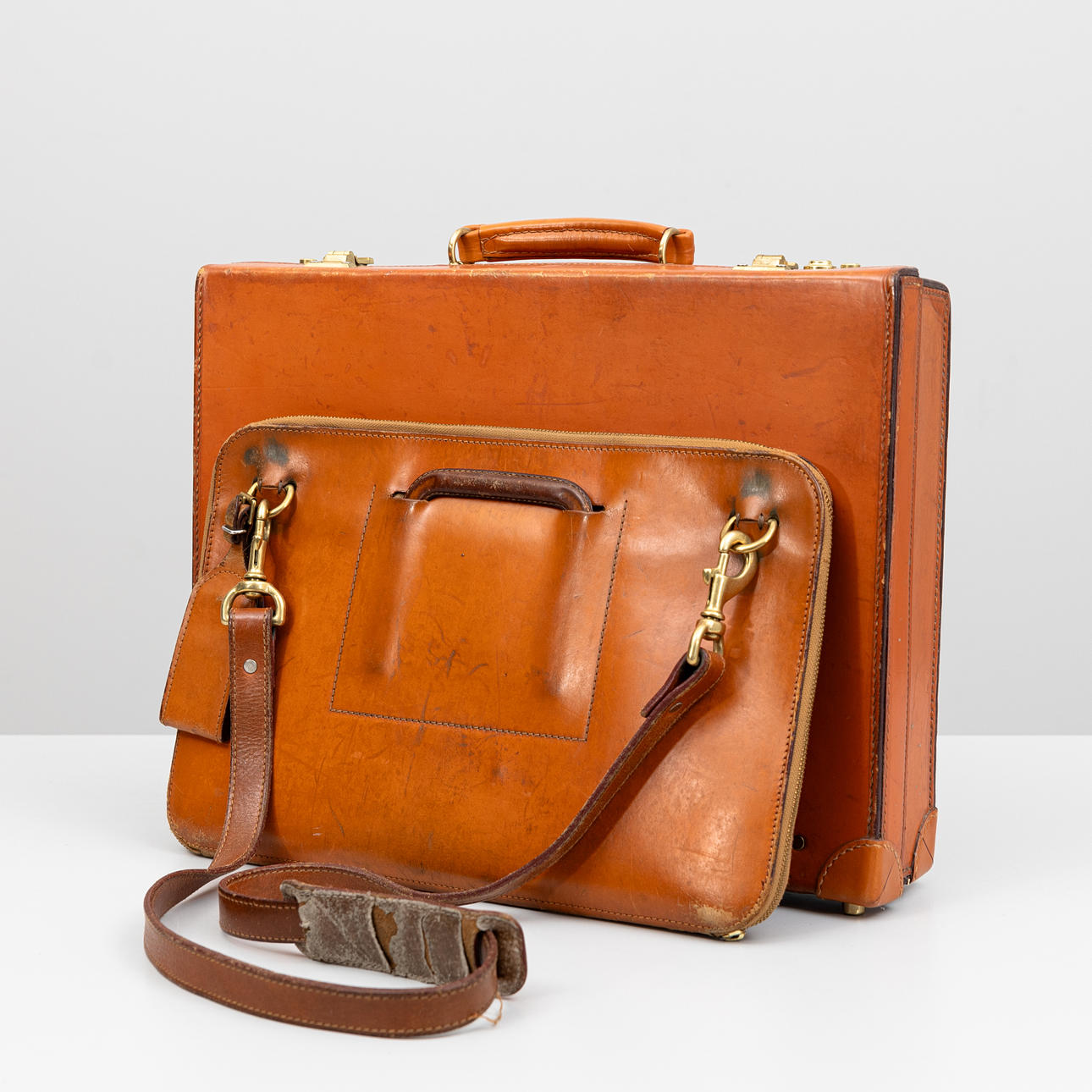SWAINE ADENEY. Two leather briefcases, London, second half of the