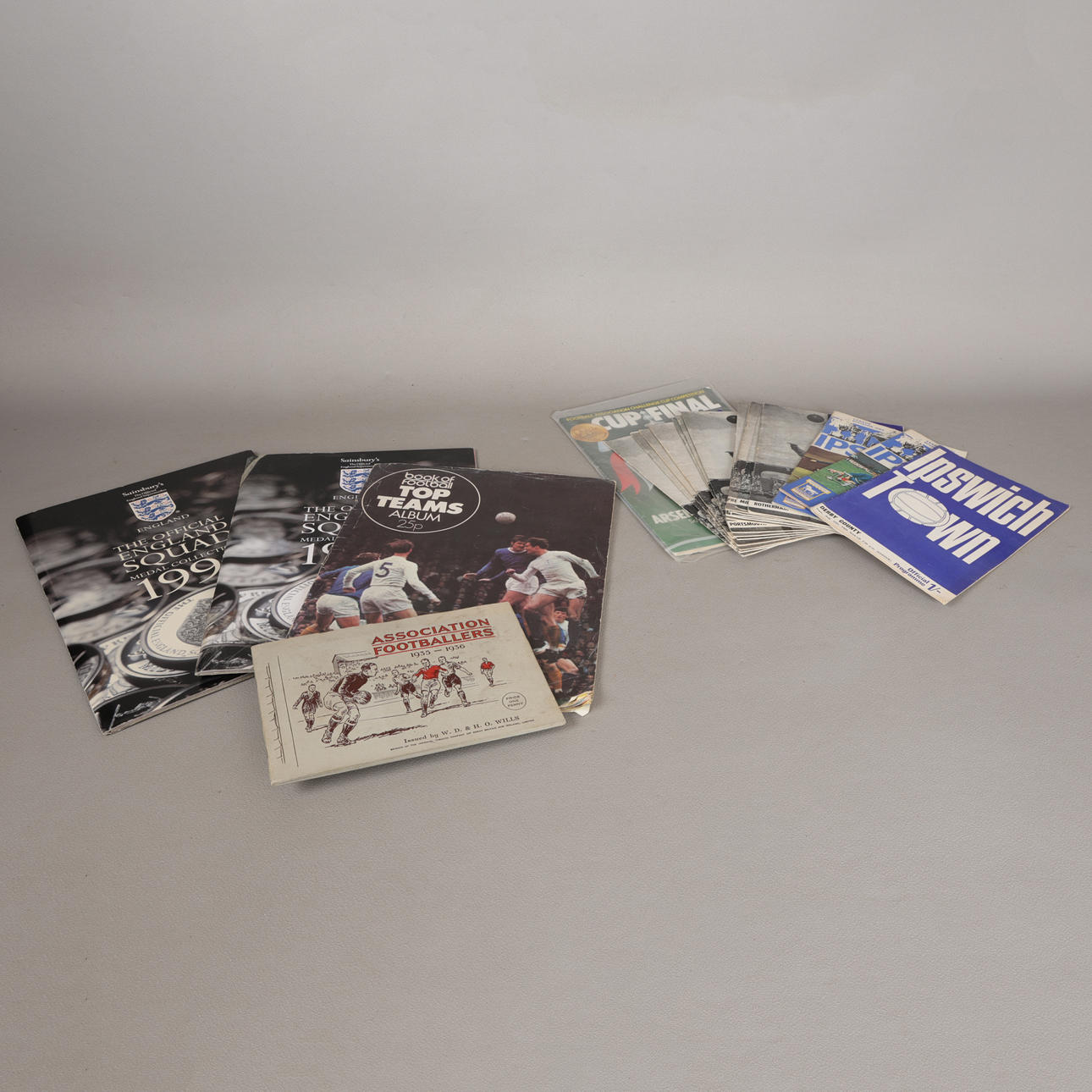 A COLLECTION OF FOOTBALL PROGRAMMES AND COLLECTABLES (22). Collectables ...