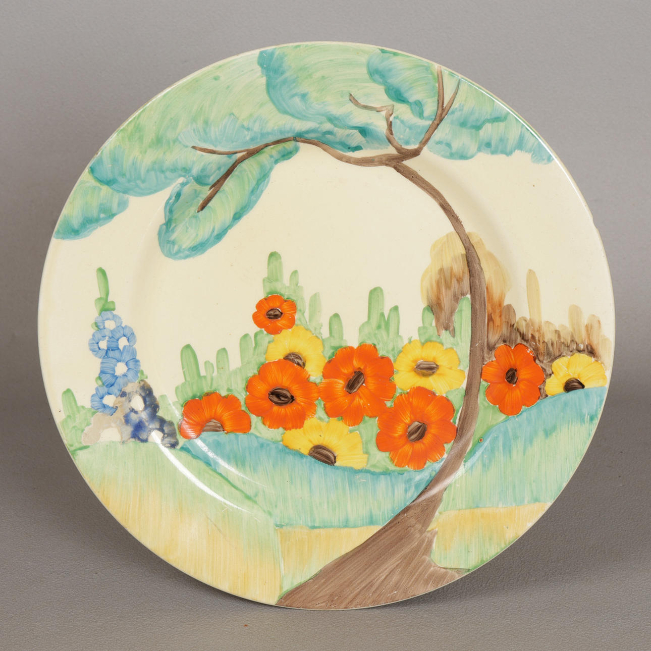 A BIZARRE BY CLARICE CLIFF "FRAGRANCE" PATTERN PLATE.