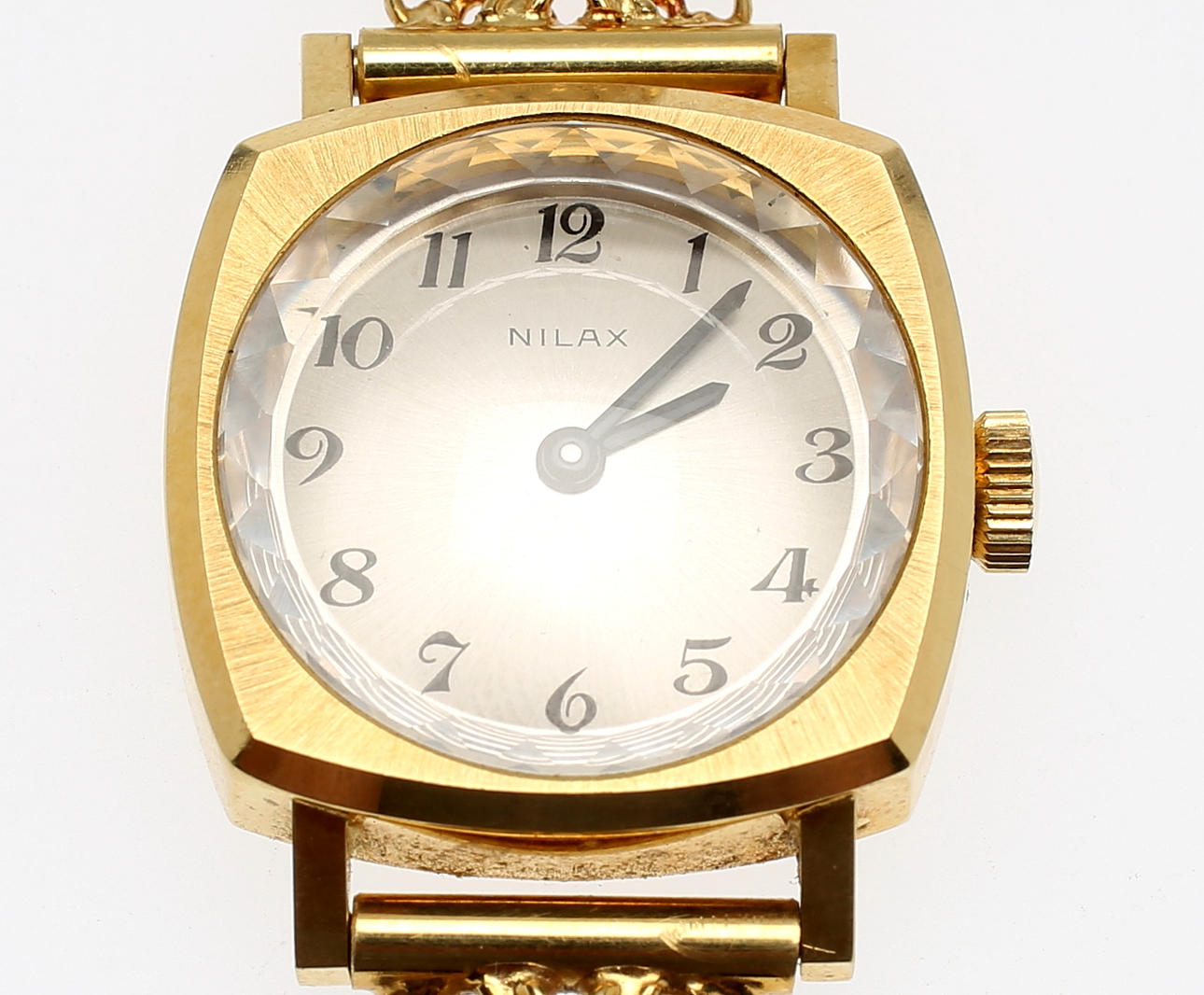 DAMARMBANDSUR, 18K guld, Nilax. Totalvikt ca 26,1 g.