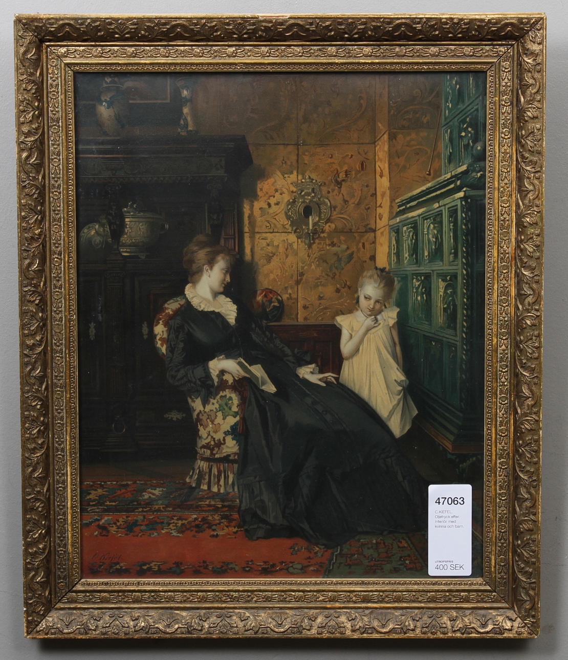 C.KIEFEL. Oljetryck efter. Interiör med kvinna och barn.