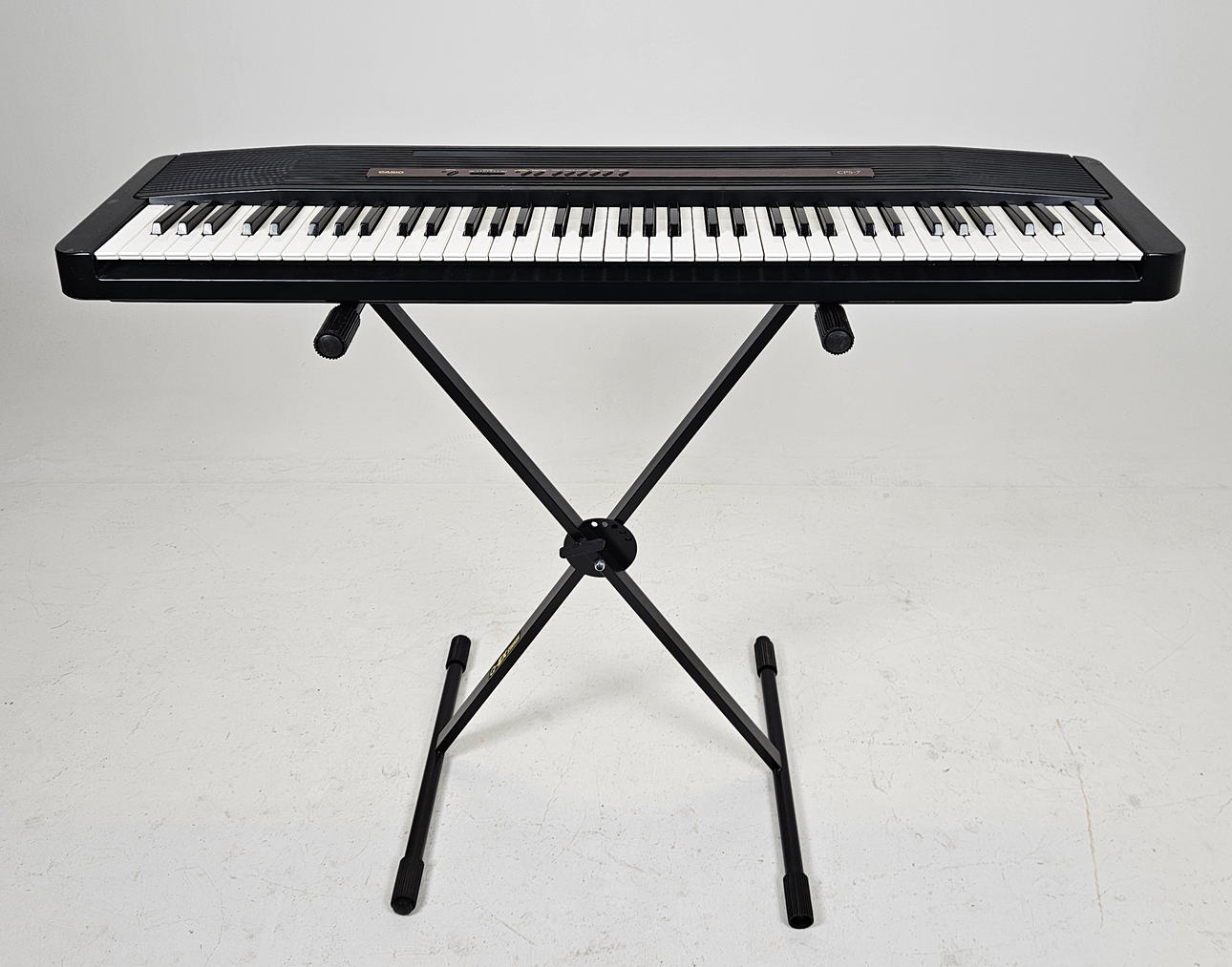 TECLADO, Casio CPS-7 sobre soporte, soportes QX.