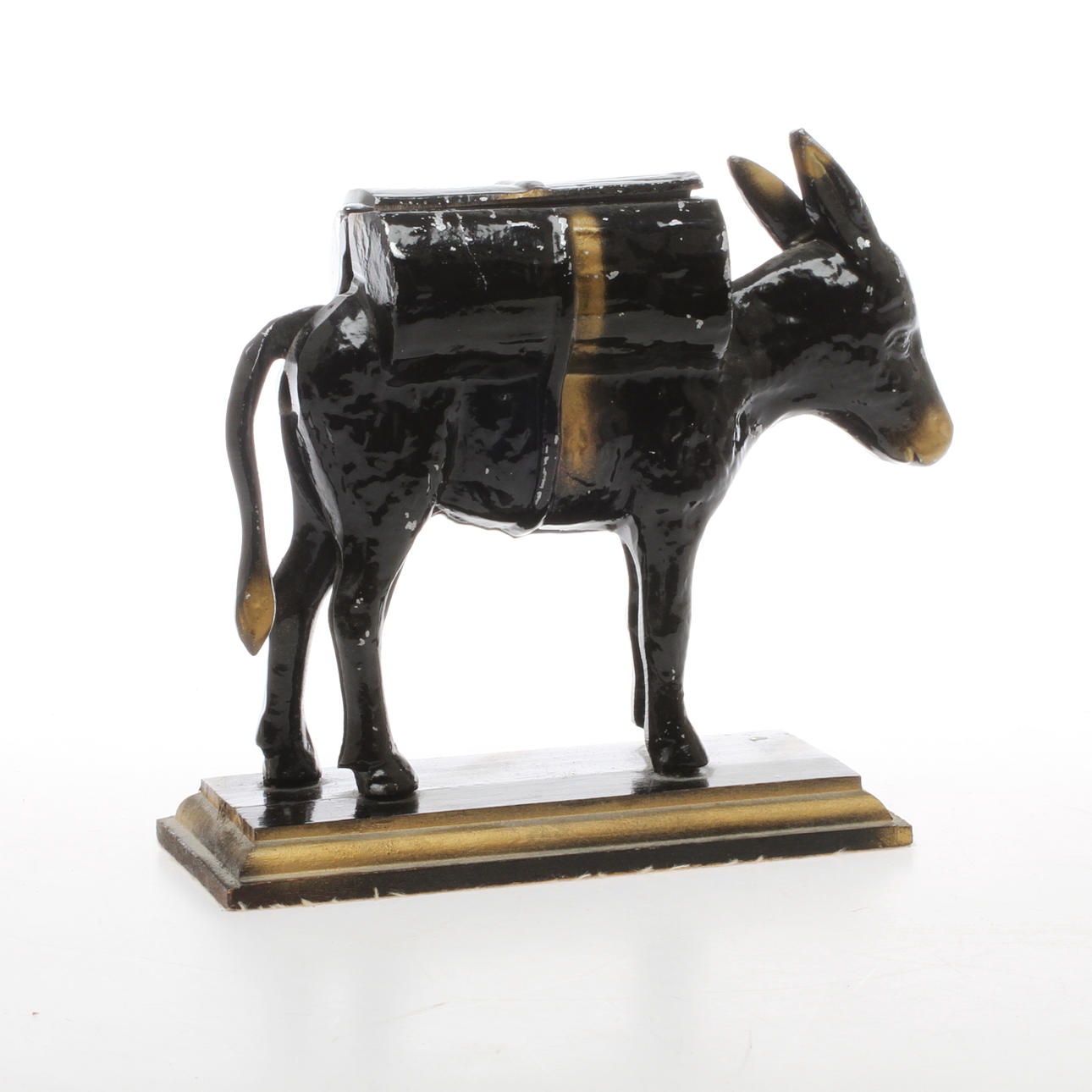 CIGARETTSKRIN i form av åsna, metall, omkring 1900-talets mitt.