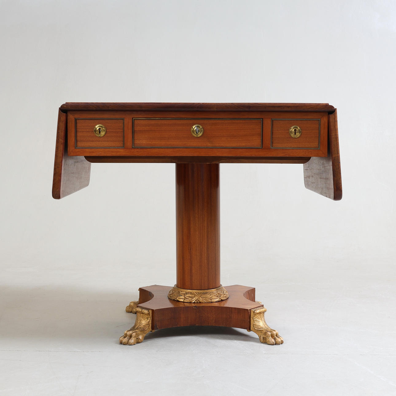 An empire-style folding table, 20th century.
