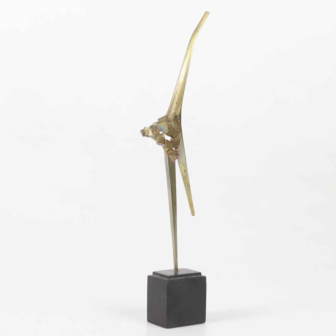 WOLFRAM BECK. Sculpture, “Cutting egger”, brass.