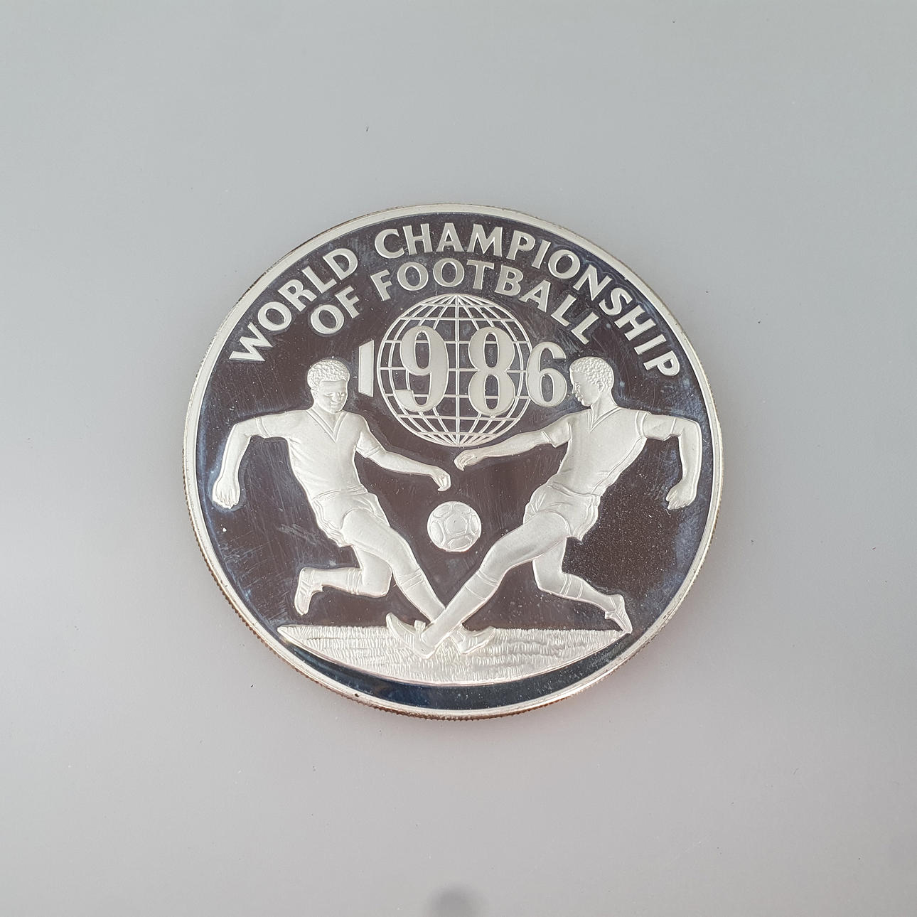 Sterling silver coin from Jamaica; soccer World Cup 1986, 100