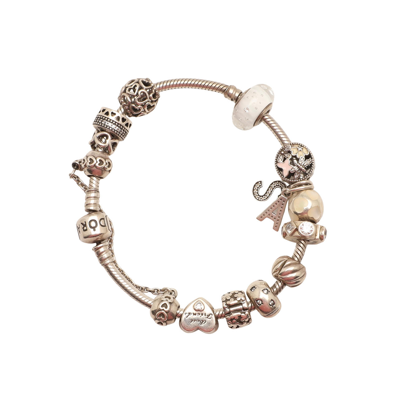 A PANDORA SILVER BRACELET AND CHARMS.