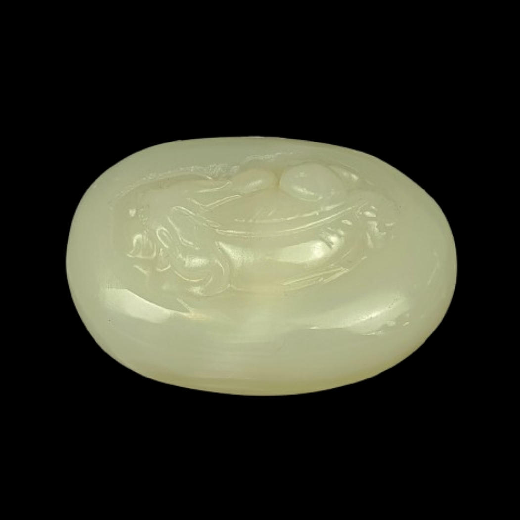 CHINESE PEBBLE JADE CARVING.