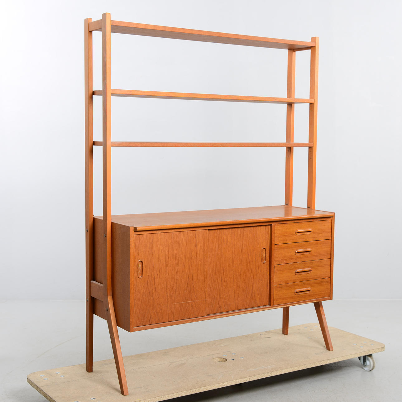 A teak bookcase, 1950s/60s.