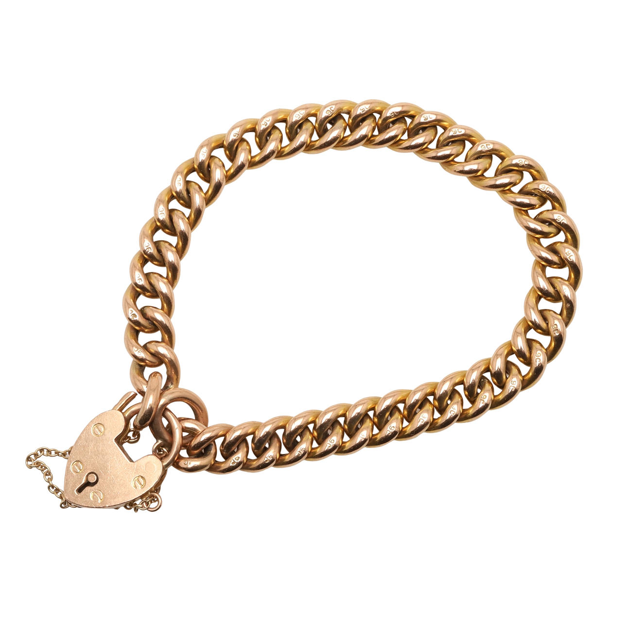 A 9CT GOLD CURB LINK BRACELET.