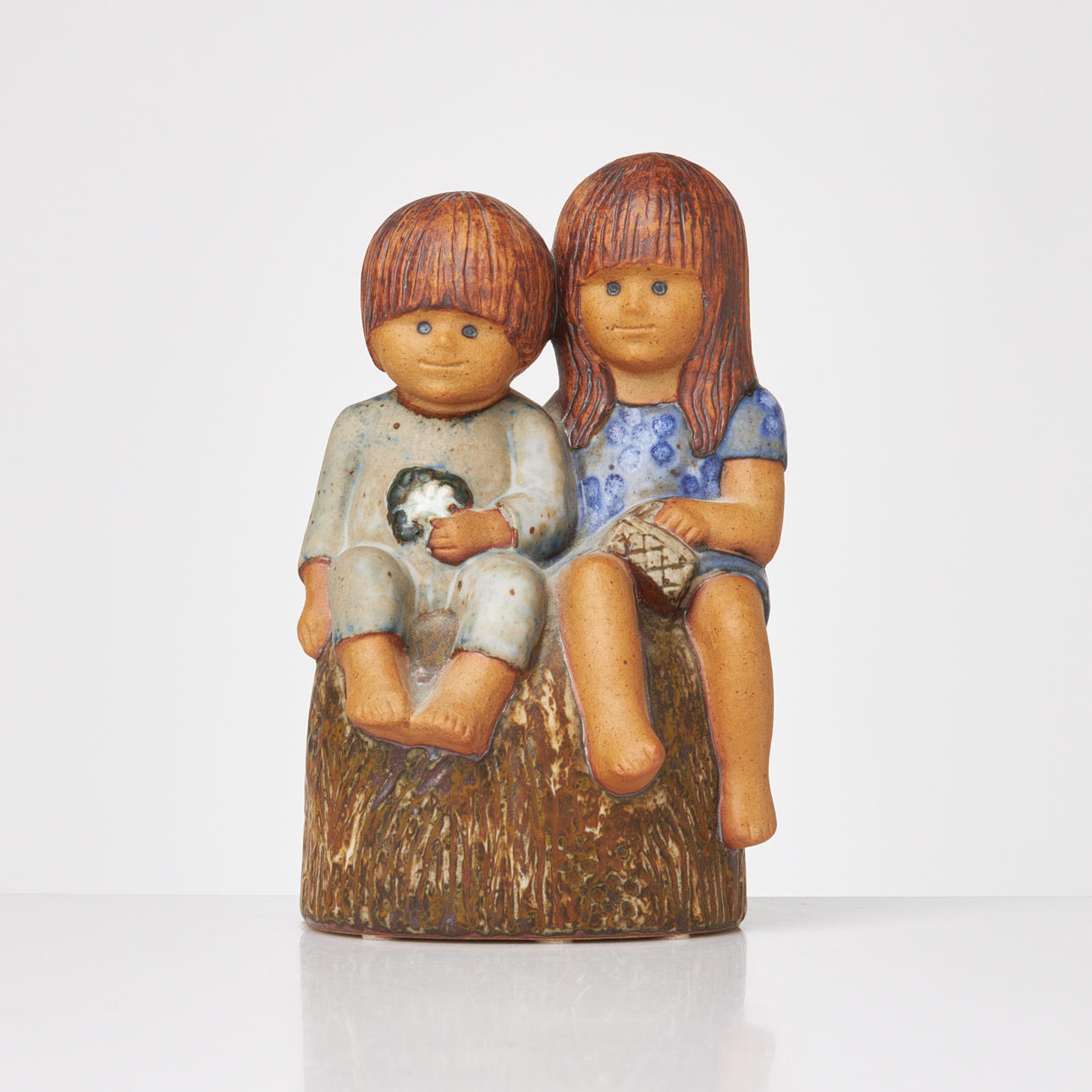 LISA LARSON. “Siblings”, figurine group, partly glazed stoneware.