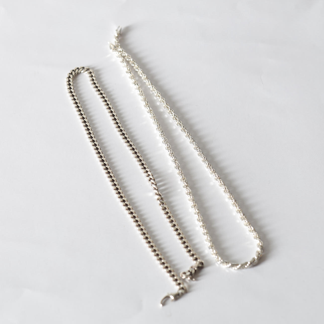SCRAP SILVER, Necklace, 2 pcs, silver. Total weight approx. 60 g.