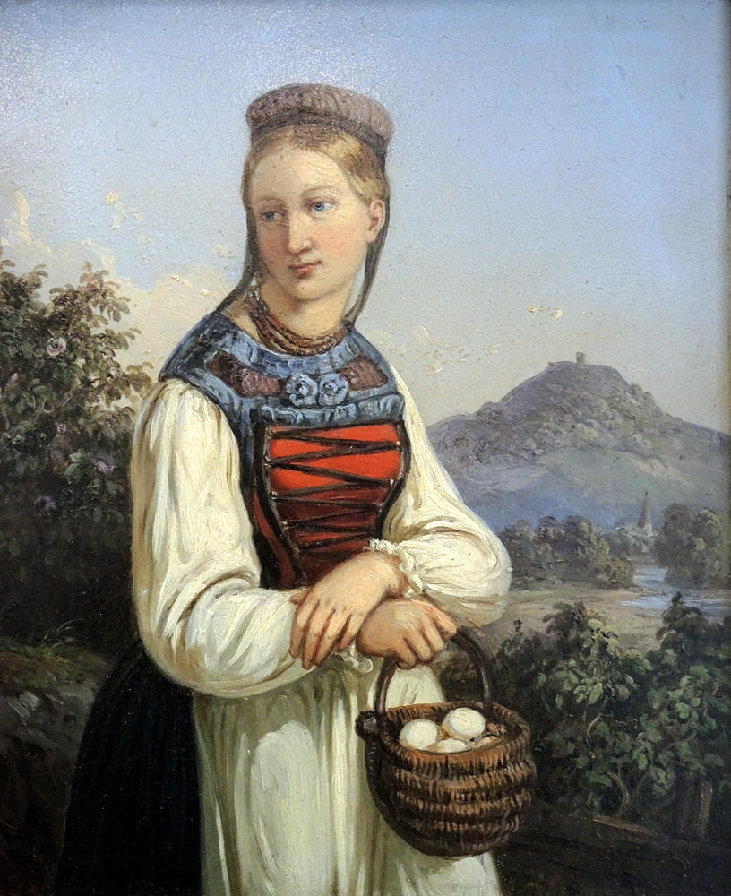 FLICKA MED ETT ÄGG KORG.